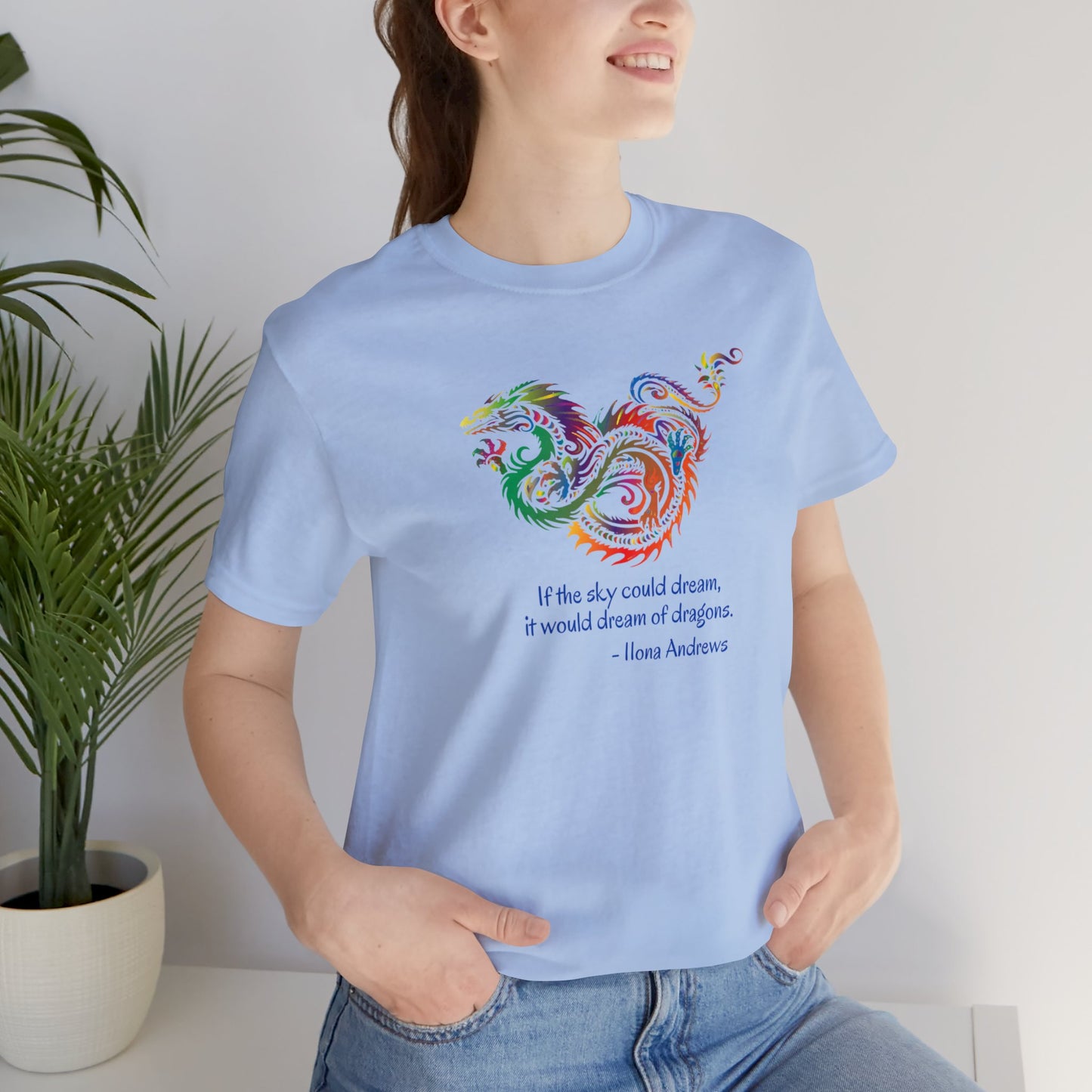 Dream of Dragons Short Sleeve Bella+Canvas T-shirt, Light Colors, Ilona Andrews Quote: "If the sky could dream, it would dream of dragons."