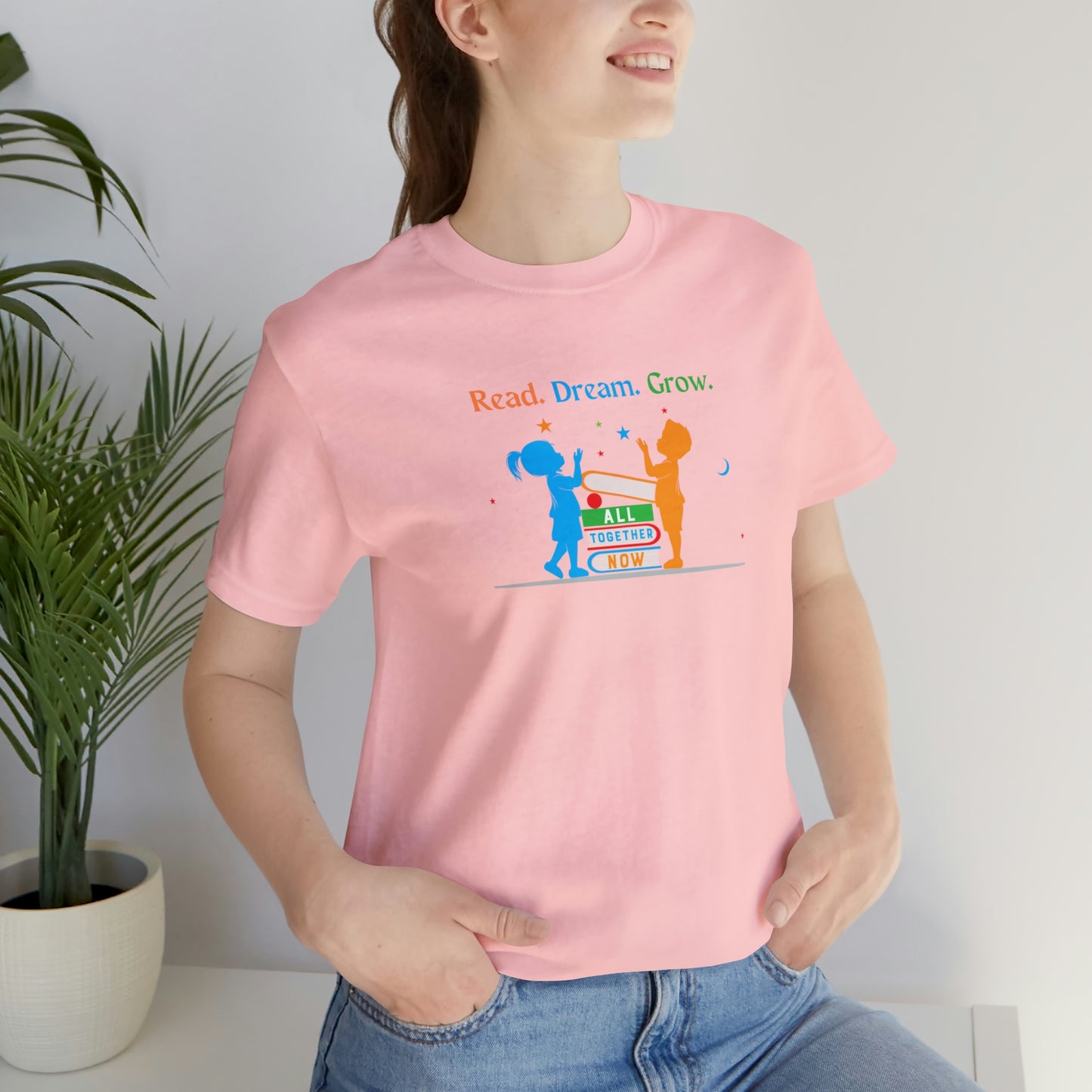 Children with Books, All Together Now Theme T-shirt with "Read, Dream, Grow" text